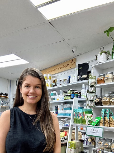 Karlea Kratzmann (registered naturopath) standing inside the Organics 4 Life health food store, based in Woody Point. 
